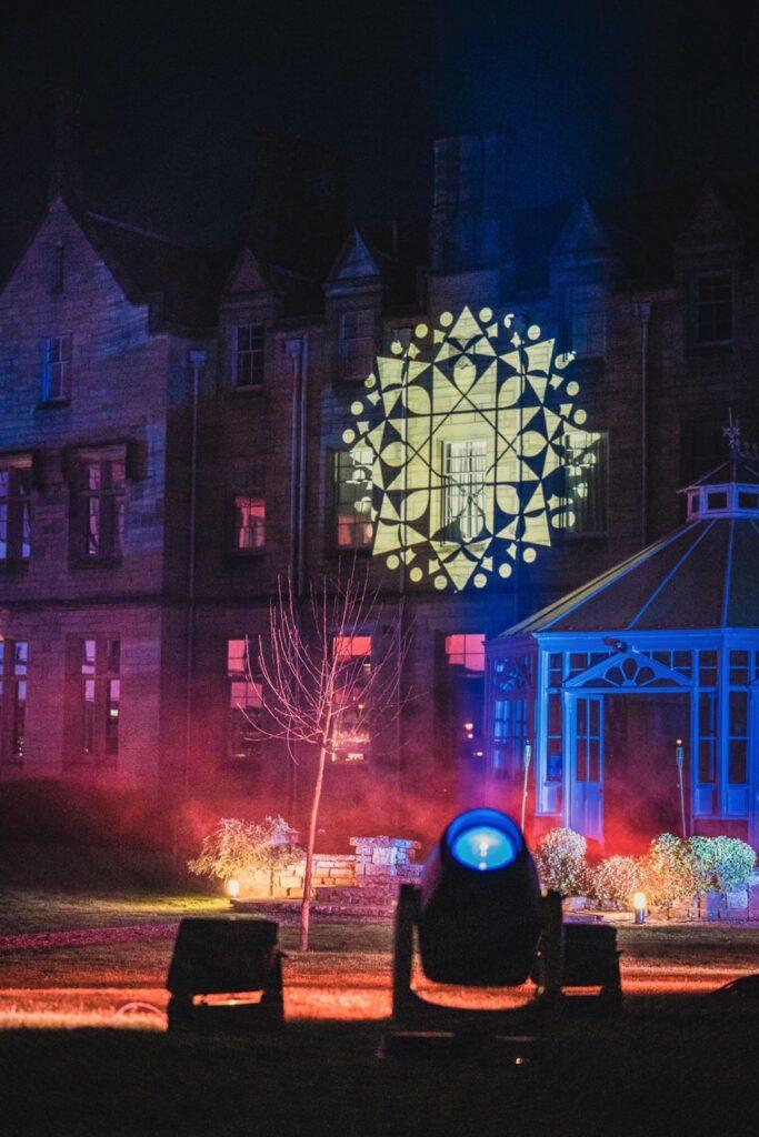 SCHLOSS Roxburghe launch party production with bespoke projection