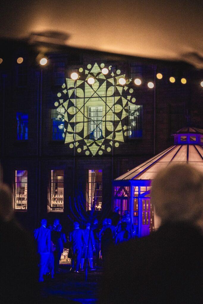 SCHLOSS Roxburghe launch party production with bespoke projection